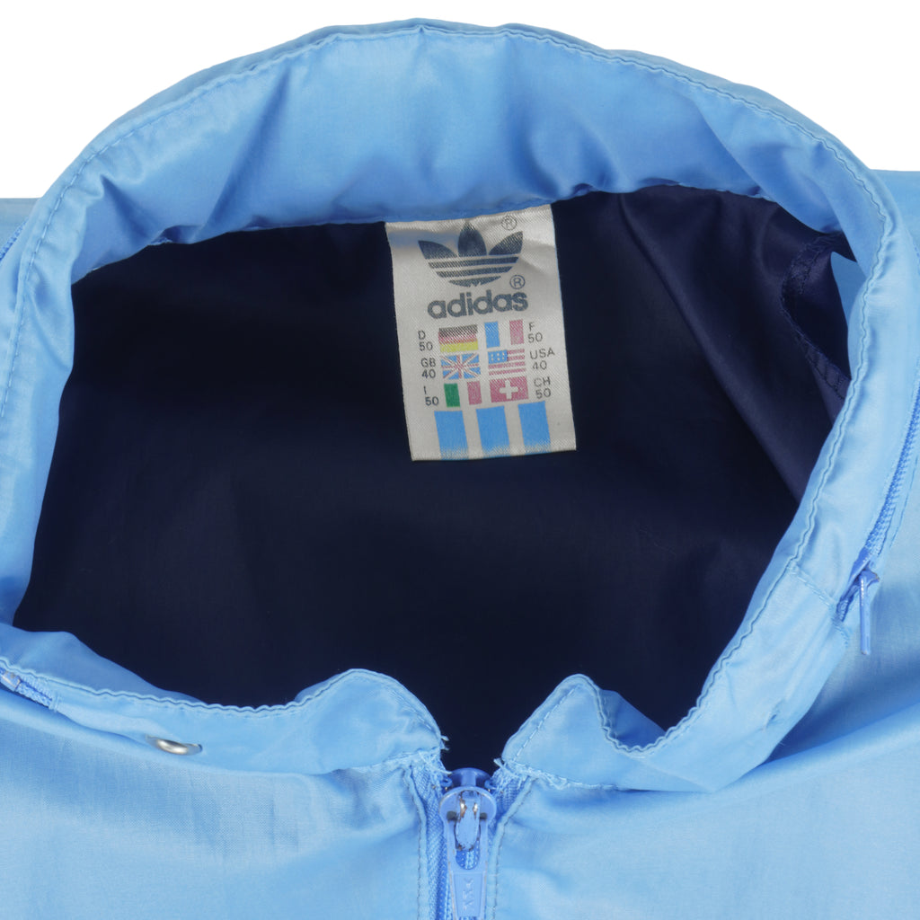 Adidas - Light Blue Windbreaker 1990s X-Large