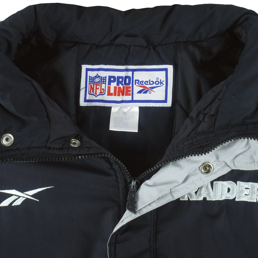 Reebok (Pro Line)- Oakland Raiders Puffer Jacket 1990s X-Large Vintage Retro Football