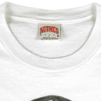 Nutmeg Mills large label inside the white ribbed crew neckline