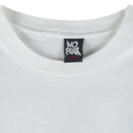 1990s Vintage No Fear You Can't Steal Second With Your Foot On First T-Shirt. White in color, fits large size and is in excellent condition.