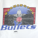 1990s Vintage NBA Washington Bullets Big Spell-Out & Logo T-Shirt by Team Champ. White in color, fits X-large size and is in excellent condition.
