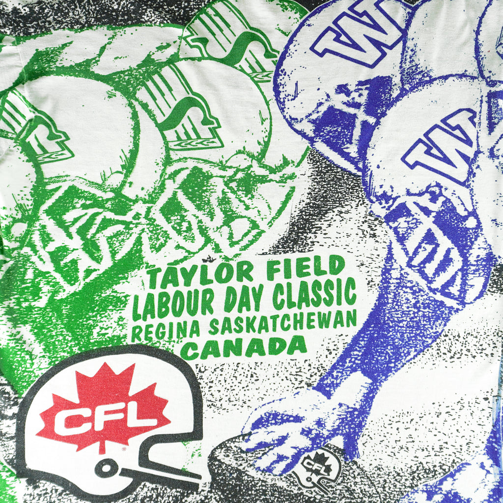 CFL - Taylor Fileld Labour Day Classic All Over Print T-Shirt 1990s X-Large Vintage Retro Football