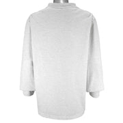 NFL (Nutmeg) - Los Angeles Raiders Long Sleeve Shirt 1990s X-Large vintage retro football