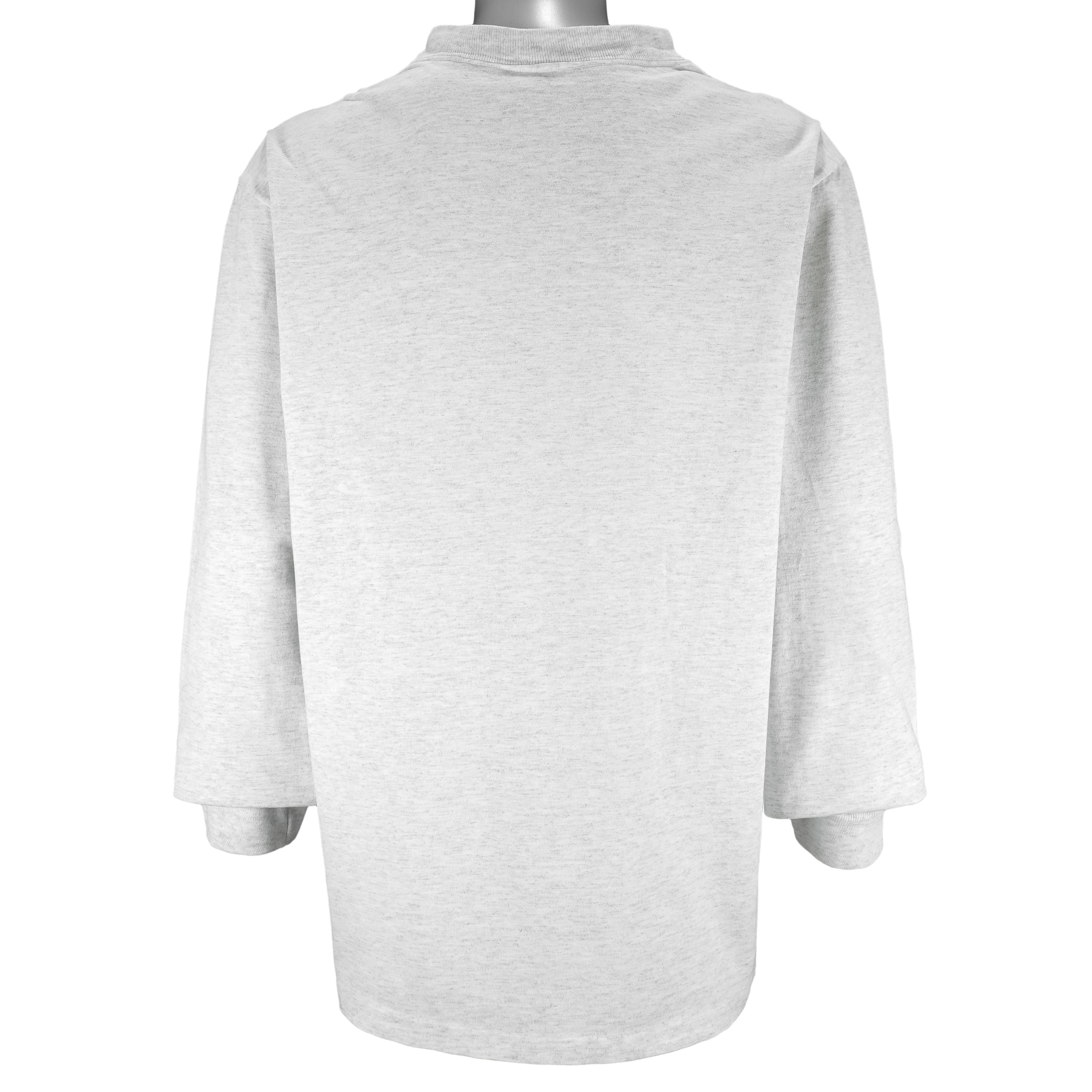 NFL (Nutmeg) - Los Angeles Raiders Long Sleeve Shirt 1990s X-Large vintage retro football
