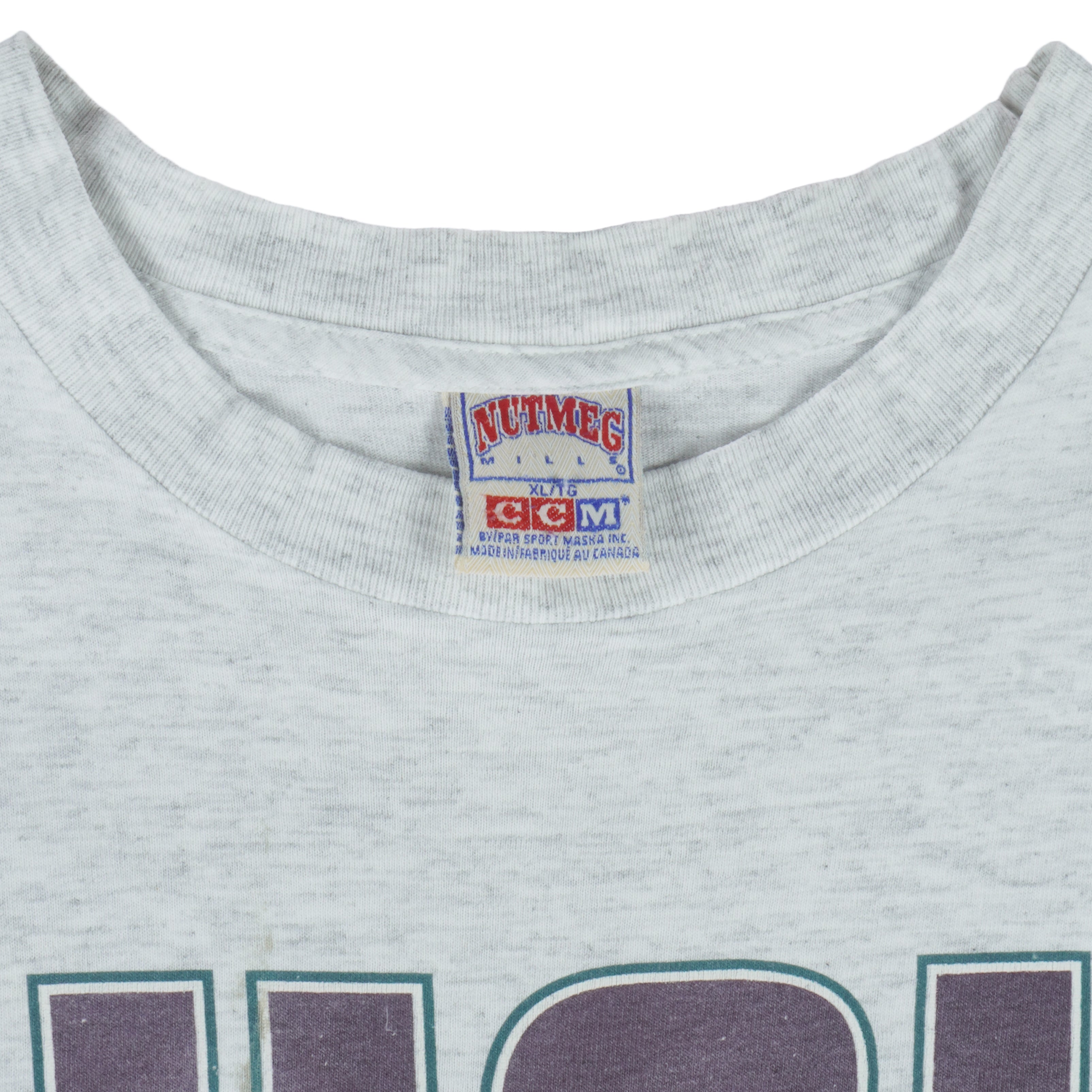 NHL (Nutmeg) - Anaheim Mighty Ducks T-Shirt 1990s X-LargeNHL (Nutmeg) - Anaheim Mighty Ducks T-Shirt 1990s X-Large vintage retro hockey