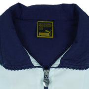 1990s vintage Puma colorblock taped logo windbreaker. Dark blue, green and white in color, fitting medium in size and in excellent condition.