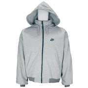 1990s vintage Nike reversible colorblock jacket-to-hoodie sweatshirt. Green and grey in color with large embroidered swoosh on windbreaker side, Medium in size and is in excellent condition.