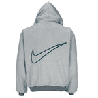 1990s vintage Nike reversible colorblock jacket-to-hoodie sweatshirt. Green and grey in color with large embroidered swoosh on windbreaker side, Medium in size and is in excellent condition.