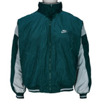 1990s vintage Nike reversible colorblock jacket-to-hoodie sweatshirt. Green and grey in color with large embroidered swoosh on windbreaker side, Medium in size and is in excellent condition.