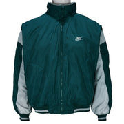 1990s vintage Nike reversible colorblock jacket-to-hoodie sweatshirt. Green and grey in color with large embroidered swoosh on windbreaker side, Medium in size and is in excellent condition.