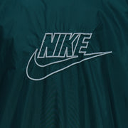 1990s vintage Nike reversible colorblock jacket-to-hoodie sweatshirt. Green and grey in color with large embroidered swoosh on windbreaker side, Medium in size and is in excellent condition.