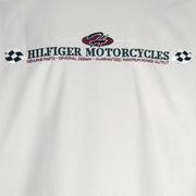 1990s vintage Tommy Hilfiger Racing work jacket. Beige in color with red and black stripes down right side and sleeves. Embroidered Hilfiger Motorcycles logo on front, back and left sleeve, Medium in size and in excellent condition.