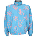 1990s vintage Reebok graffiti-patterned windbreaker. Baby blue in color with pink designs. Fitting Medium in size and in excellent condition.