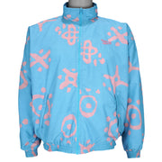 1990s vintage Reebok graffiti-patterned windbreaker. Baby blue in color with pink designs. Fitting Medium in size and in excellent condition.