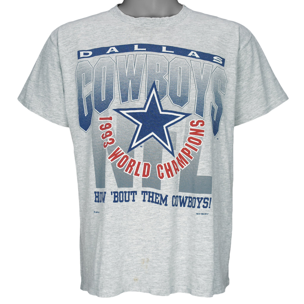 1993 vintage NFL Dallas Cowboys World champions spell-out T-Shirt. Grey in color with words "How 'Bout The Cowboys!" on front, Large in size and in very good condition.