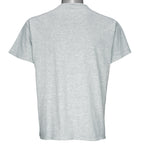 1993 vintage NFL Dallas Cowboys World champions spell-out T-Shirt. Grey in color with words "How 'Bout The Cowboys!" on front, Large in size and in very good condition.
