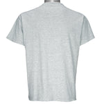 1993 vintage NFL Dallas Cowboys World champions spell-out T-Shirt. Grey in color with words "How 'Bout The Cowboys!" on front, Large in size and in very good condition.