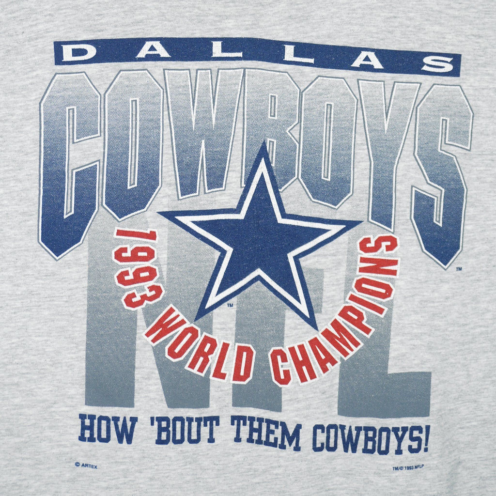 1993 vintage NFL Dallas Cowboys World champions spell-out T-Shirt. Grey in color with words "How 'Bout The Cowboys!" on front, Large in size and in very good condition.