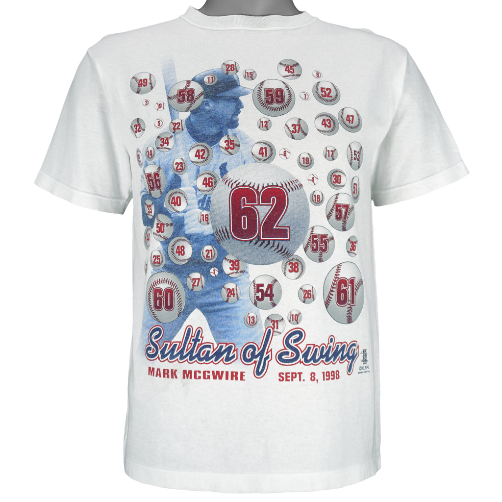 1998 vintage MLB St. Louis Cardinals Sultan of Swing Mark McGwire Single Stitch T-Shirt by Starter. White in color with spell-out and player image on front, Starter patch on left sleeve, fits Medium in size and is in excellent condition.