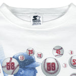 1998 vintage MLB St. Louis Cardinals Sultan of Swing Mark McGwire Single Stitch T-Shirt by Starter. White in color with spell-out and player image on front, Starter patch on left sleeve, fits Medium in size and is in excellent condition.
