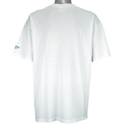 1994 vintage Reebok NFL Miami Dolphins spell-out T-Shirt. White in color with image of a football with teeth on front and Reebok logo on left sleeve, fits X-Large in size and is in excellent condition.