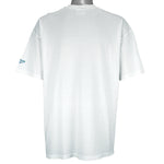 1994 vintage Reebok NFL Miami Dolphins spell-out T-Shirt. White in color with image of a football with teeth on front and Reebok logo on left sleeve, fits X-Large in size and is in excellent condition.