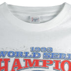 1993 vintage MLB Toronto Blue Jays World Series Champions single stitch T-Shirt by Starter (tagged Sogo). White in color with spell-out and "We Win" graphic on front, Large in size and is in excellent condition.