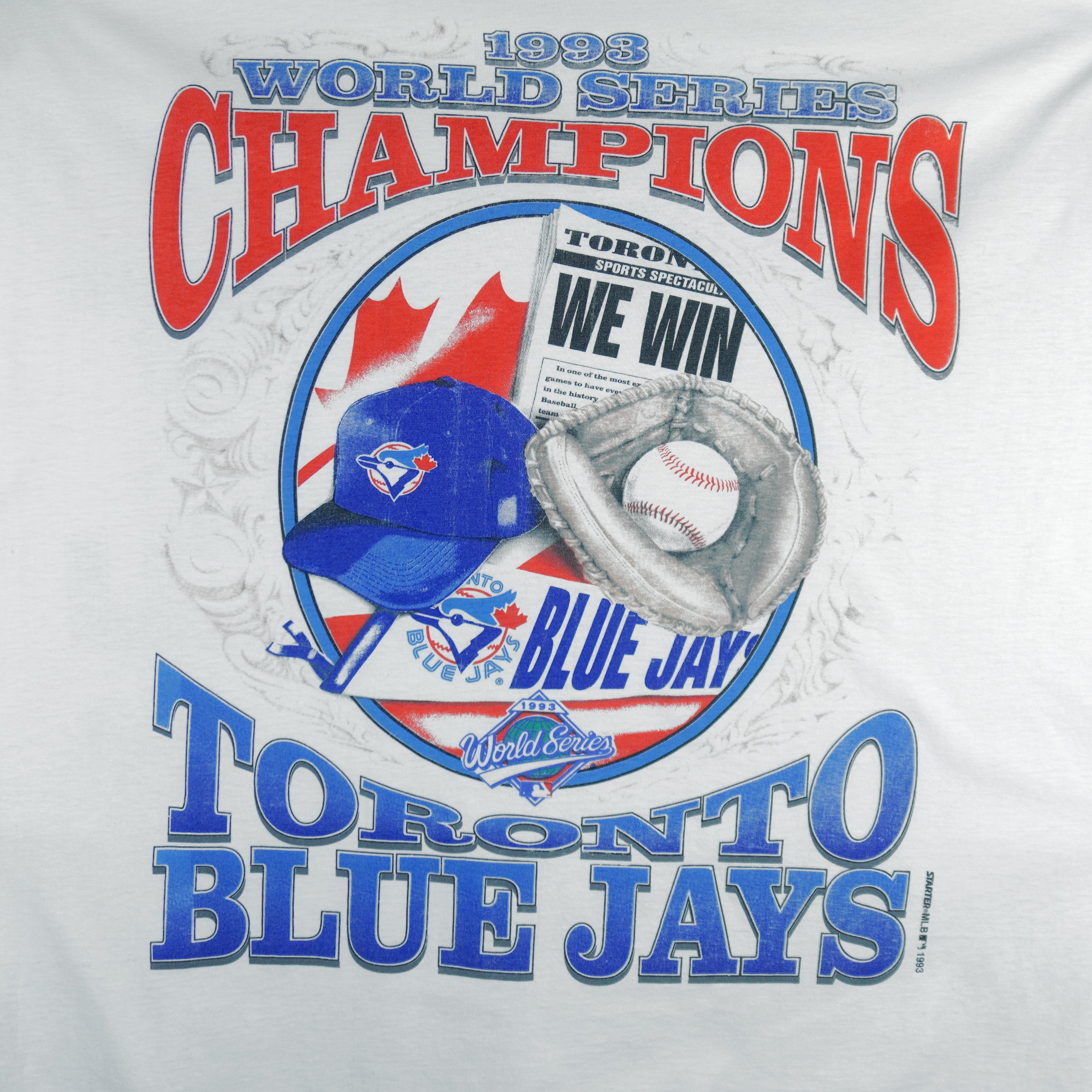 1993 vintage MLB Toronto Blue Jays World Series Champions single stitch T-Shirt by Starter (tagged Sogo). White in color with spell-out and "We Win" graphic on front, Large in size and is in excellent condition.