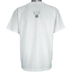 1992 vintage Big Ball Sports T-Shirt. White​ in color with spell-out "Football Is Life: The Rest is Just Details" on front and small brand logo on back, Large in size and in excellent condition.
