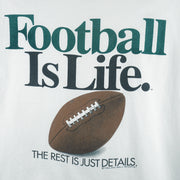1992 vintage Big Ball Sports T-Shirt. White​ in color with spell-out "Football Is Life: The Rest is Just Details" on front and small brand logo on back, Large in size and in excellent condition.