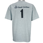 1990s vintage NBA New York Knicks Junior League T-Shirt from Jerzees. Grey in color with YMCA, Sprite, Knicks and Nike logos on front, Foot Locker logo on back, Large in size and is in excellent condition.