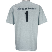 1990s vintage NBA New York Knicks Junior League T-Shirt from Jerzees. Grey in color with YMCA, Sprite, Knicks and Nike logos on front, Foot Locker logo on back, Large in size and is in excellent condition.