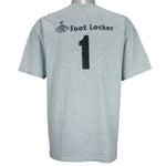 1990s vintage NBA New York Knicks Junior League T-Shirt from Jerzees. Grey in color with YMCA, Sprite, Knicks and Nike logos on front, Foot Locker logo on back, Large in size and is in excellent condition.