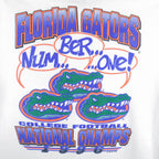 1996 vintage NCAA Florida Gators National Champions T-Shirt by Mr Tees. White in color with "Num... Ber... ...One!" spell-out graphic on back, Large in size and in excellent condition.
