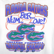 1996 vintage NCAA Florida Gators National Champions T-Shirt by Mr Tees. White in color with "Num... Ber... ...One!" spell-out graphic on back, Large in size and in excellent condition.