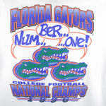 1996 vintage NCAA Florida Gators National Champions T-Shirt by Mr Tees. White in color with "Num... Ber... ...One!" spell-out graphic on back, Large in size and in excellent condition.