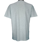 1990s vintage Oklahoma "The Sooner State" T-Shirt by Fruit of the Loom. Grey in color with various state facts and history printed on front, Large in size and is in excellent condition.
