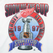 1997 vintage Starter NHL Detroit Red Wings "Show Me The Cup" Stanley Cup Champions T-Shirt. White in color with big spell-out and logo, X-Large in size and in excellent condition.