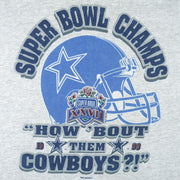 1993 vintage NFL Dallas Cowboys Super Bowl XXVII Champions T-Shirt. Grey in color with spell-out "How 'Bout them Cowboys" and helmet printed on front, fits Large in size and in excellent condition.