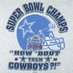 1993 vintage NFL Dallas Cowboys Super Bowl XXVII Champions T-Shirt. Grey in color with spell-out "How 'Bout them Cowboys" and helmet printed on front, fits Large in size and in excellent condition.