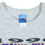 1996 vintage NCAA Kentucky Wildcats National Champions T-Shirt. Grey in color, Large in size and is in excellent condition.