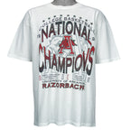 1994 vintage NCAA Arkansas Razorbacks National Champions T-Shirt by Jerzees. White in color with stats spell-out printed by Red Oak Sportswear, X-Large in size and is in excellent condition.