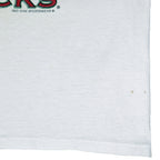 1994 vintage NCAA Arkansas Razorbacks National Champions T-Shirt by Jerzees. White in color with stats spell-out printed by Red Oak Sportswear, X-Large in size and is in excellent condition.