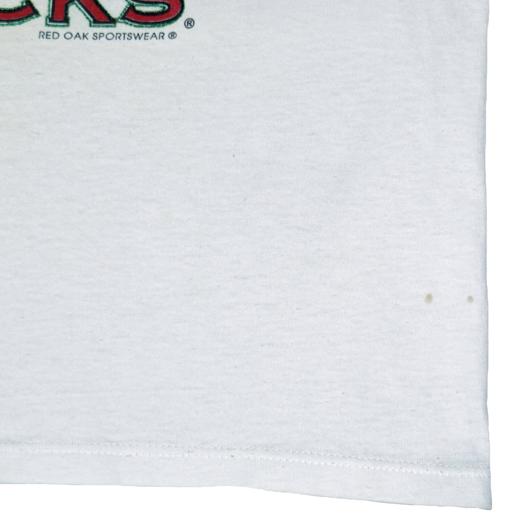 1994 vintage NCAA Arkansas Razorbacks National Champions T-Shirt by Jerzees. White in color with stats spell-out printed by Red Oak Sportswear, X-Large in size and is in excellent condition.