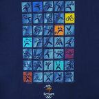 2000 vintage Sydney Summer Olympics T-Shirt by ISC, Olympic Millennium Collection. Blue in color with event icons on front, Large in size and in excellent condition.