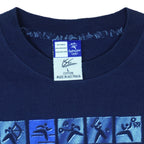 2000 vintage Sydney Summer Olympics T-Shirt by ISC, Olympic Millennium Collection. Blue in color with event icons on front, Large in size and in excellent condition.