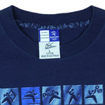 2000 vintage Sydney Summer Olympics T-Shirt by ISC, Olympic Millennium Collection. Blue in color with event icons on front, Large in size and in excellent condition.