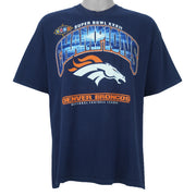 1998 vintage NFL Denver Broncos, Super Bowl XXXII Champions, T-Shirt by Lee. Blue​ in color with big spell-out and logo on front, tag is X-Large but fits Large in size and is in very good condition.