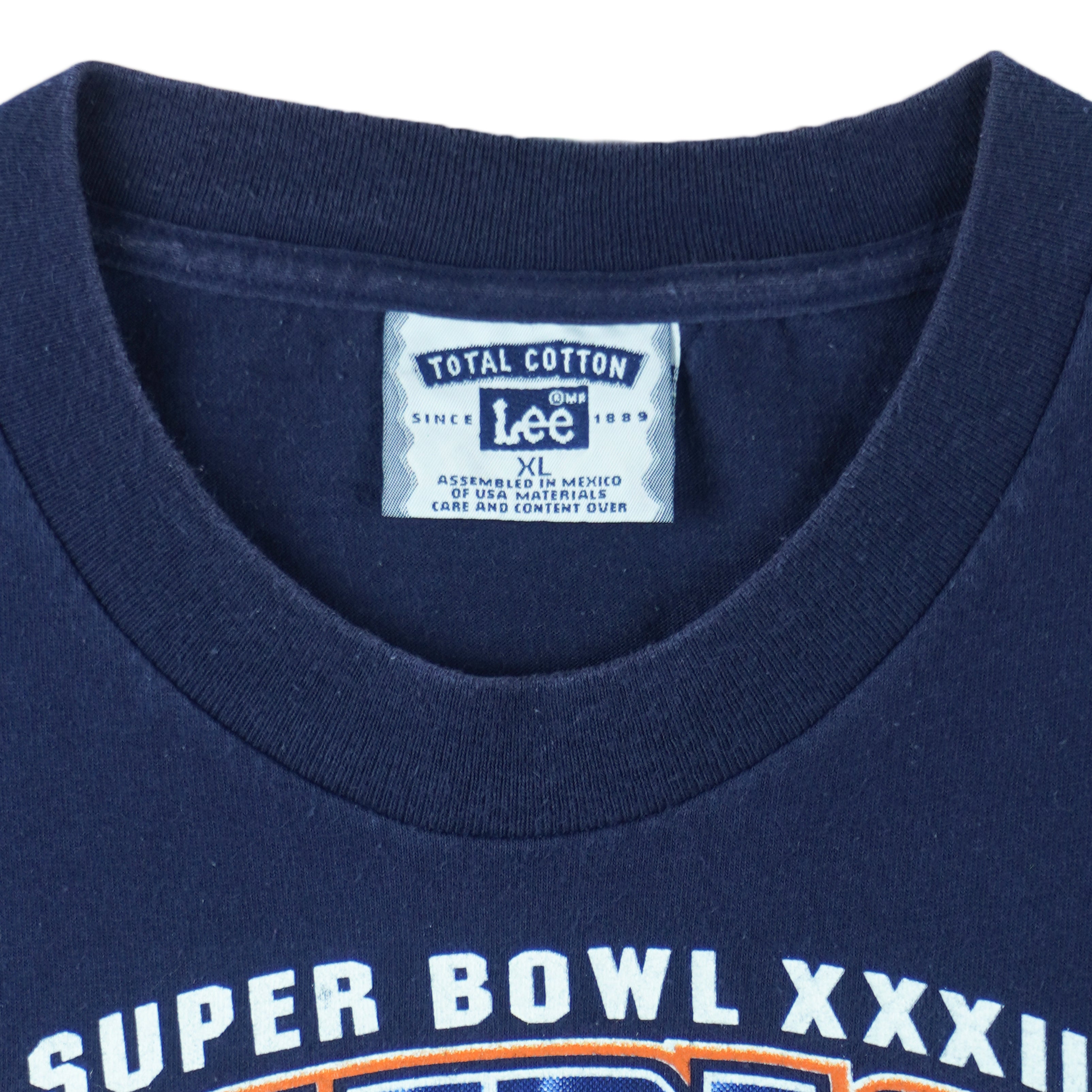 1998 vintage NFL Denver Broncos, Super Bowl XXXII Champions, T-Shirt by Lee. Blue​ in color with big spell-out and logo on front, tag is X-Large but fits Large in size and is in very good condition.