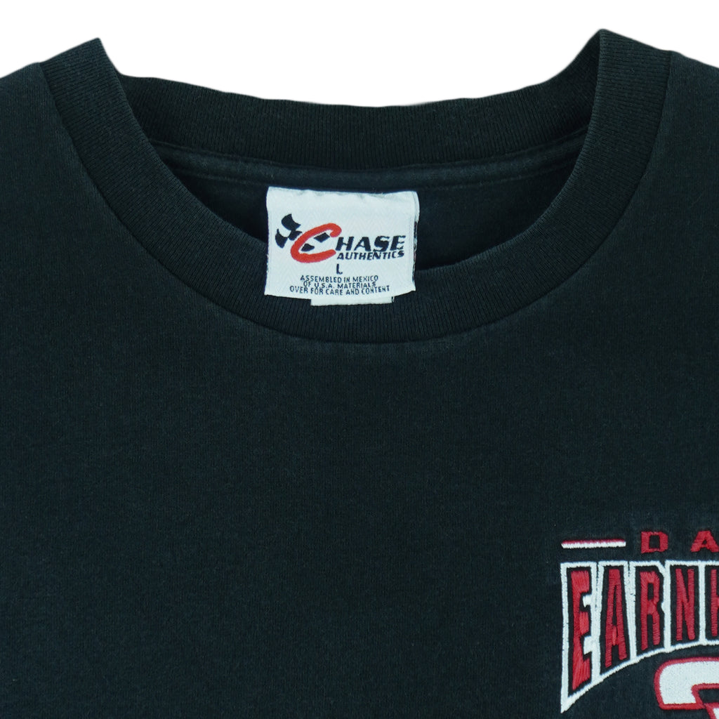 1990s vintage NASCAR Dale Earnhardt #3 embroidered T-Shirt by Chase Authentics. Black in color, Large in size and is in excellent condition.